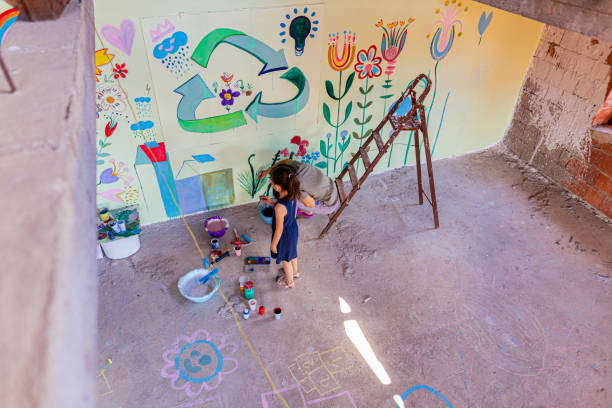 istock Decorating the wall with eco symbols 1437647279