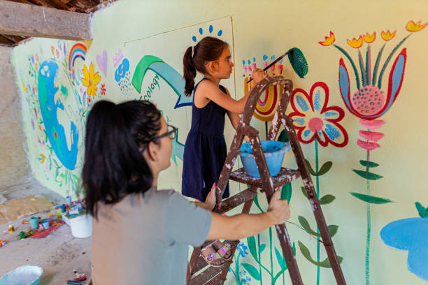 istock Family creating eco mural 1437647448