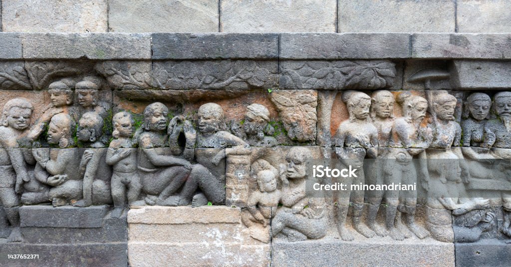 Detail of Buddhist carved relief in Borobudur temple - Java, Indonesia Ancient Stock Photo
