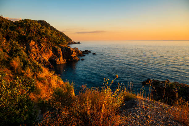 seascape of a peaceful summer sunset over the Tyrrhenian sea along the Maratea beach