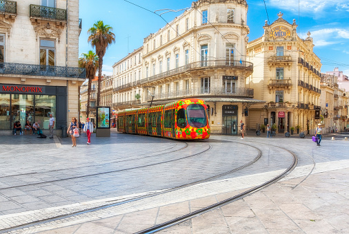 MONTPELLIER, FRANCE - June 17, 2018: City public transport. Beautiful multi-colored tramway.  The Montpellier tramway system has 4 lines and 84 stations
