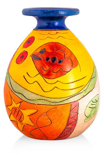 The ceramic vase with ornament on a white background