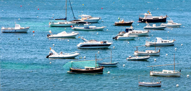 The cove with small boats in Cadacez, Spain. Selective focus