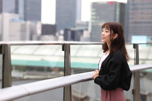 istock Beautiful young wman relaxing at rooftop 1437664240