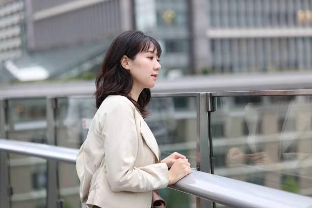 istock Beautiful young wman relaxing at rooftop 1437664245