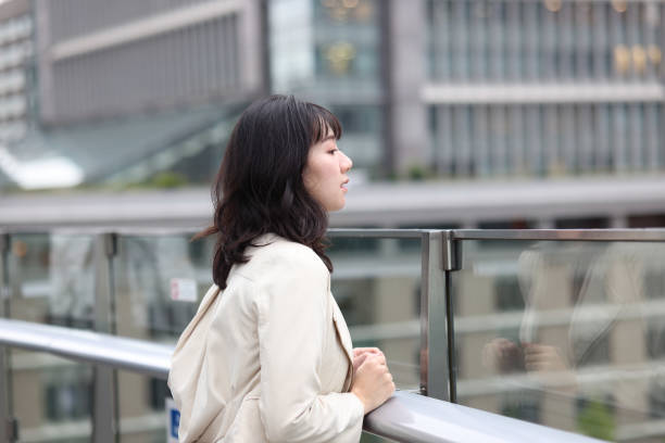 istock Beautiful young wman relaxing at rooftop 1437664253
