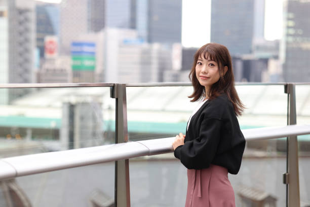 istock Beautiful young wman relaxing at rooftop 1437664268
