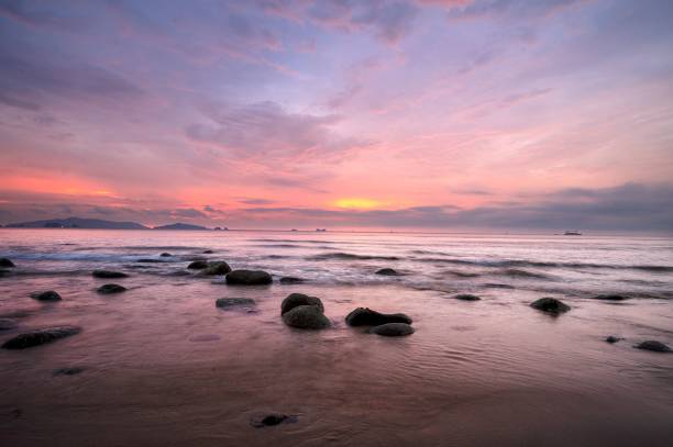 istock Beach scenery against a vivid sunset view 1437666771
