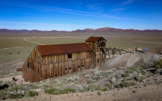 Berlin, Nevada, United States – May 15, 2019: The Mill Building stands preserved and protected in the Berlin Ghost Town of Berlin-Ichthyosaur State Park.