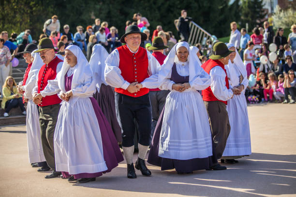 Domzale, Slovenia – June 21, 2019: Local people wearing traditional vintage national costume, dance and entertain the audience