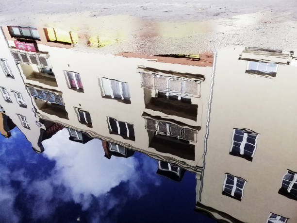 istock A mirror street puddle with a beautiful typical building reflection in Gdansk, Poland 1437672813