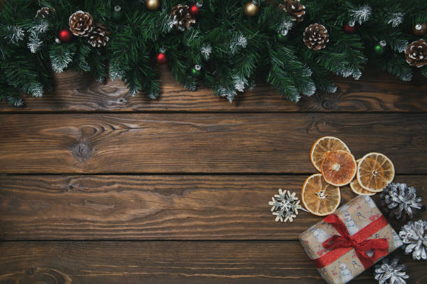 istock Christmas background with branches of a Christmas tree and decorations. Flatley with copy space. Celebrating Christmas and New Years. 1437673629