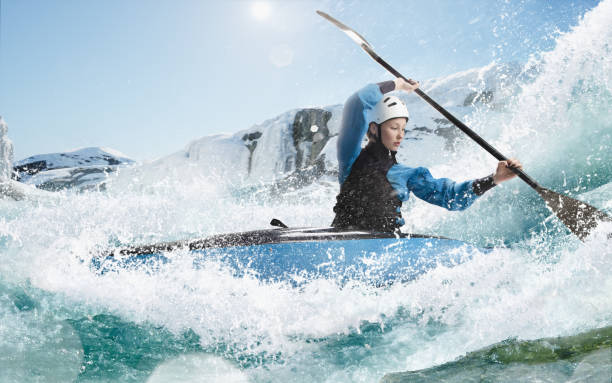 istock Woman in a kayak sails on a mountain river 1437673839