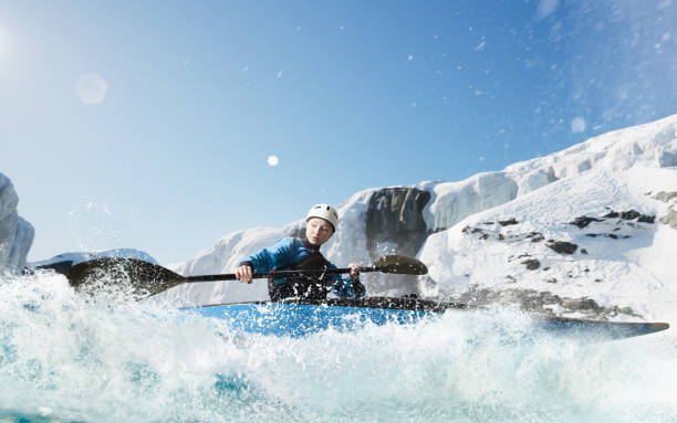 istock Woman in a kayak sails on a mountain river 1437673840