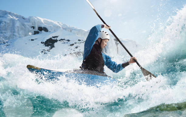 istock Woman in a kayak sails on a mountain river 1437673843