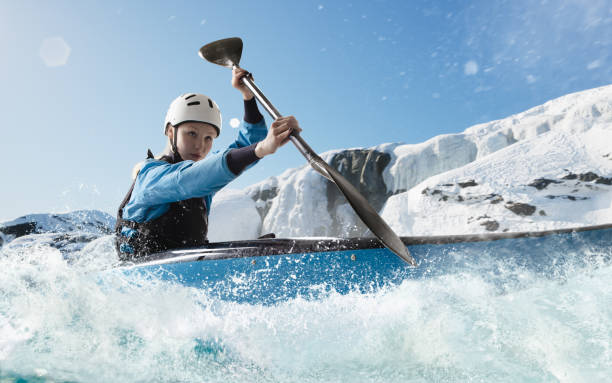istock Woman in a kayak sails on a mountain river 1437673882