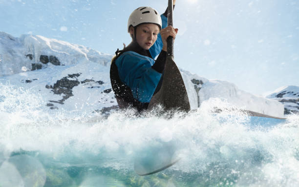 istock Woman in a kayak sails on a mountain river 1437673937