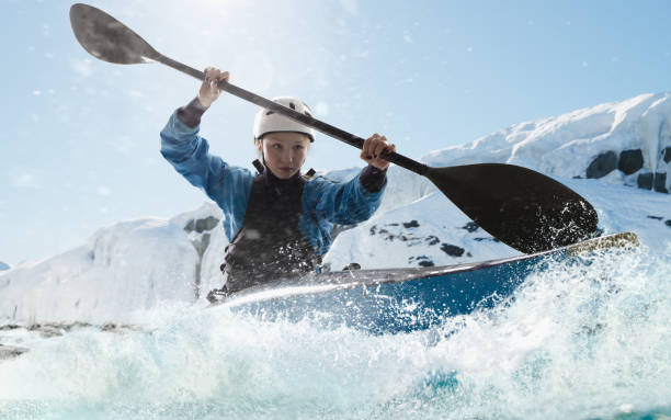 istock Woman in a kayak sails on a mountain river 1437673948
