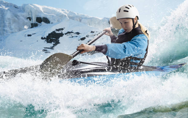 istock Woman in a kayak sails on a mountain river 1437673962