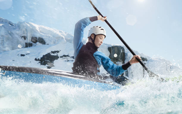 istock Woman in a kayak sails on a mountain river 1437673975