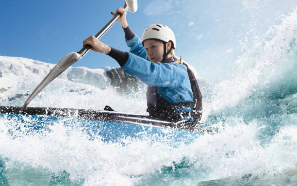 istock Woman in a kayak sails on a mountain river 1437673982