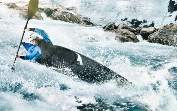 istock Woman in a kayak sails on a mountain river 1437673985