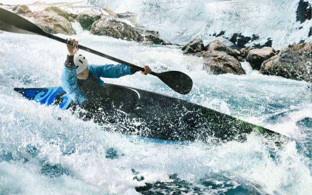 istock Woman in a kayak sails on a mountain river 1437673986