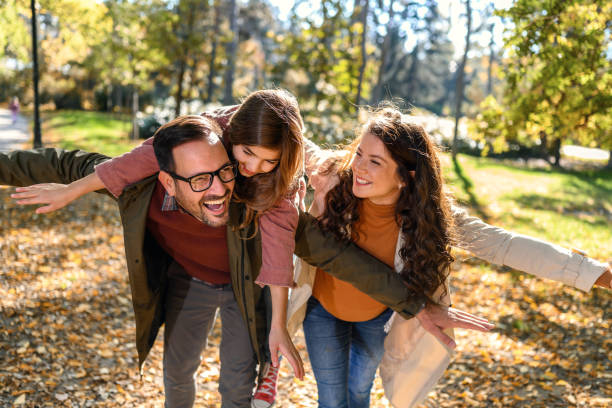 istock Happy family having fun outdoors. 1437679085