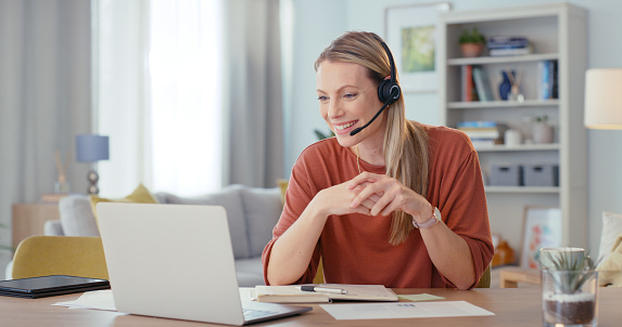 Consulting, communication and laptop with woman in home office for webinar, video call and online meeting with remote work. Contact, internet and technology with employee at desk for customer support