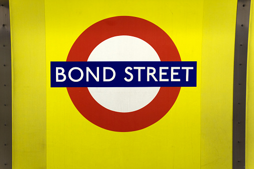 Sign at underground station Bond Street at City of London on a summer day. Photo taken August 3rd, 2022, London, United Kingdom.