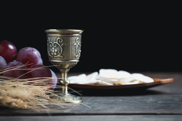Concept of Eucharist or holy communion of Christianity. Eucharist is sacrament instituted by Jesus. during last supper with disciples. Bread and wine is body and blood of Jesus Christ of Christians. stock photo