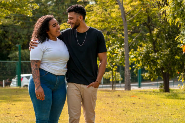 istock Young couple in a public park 1437694268
