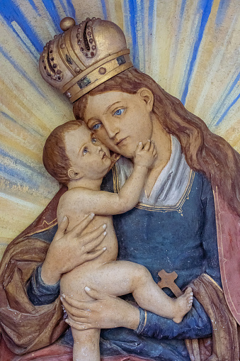Beautiful statue showing Mary mother of God holding baby Jesus