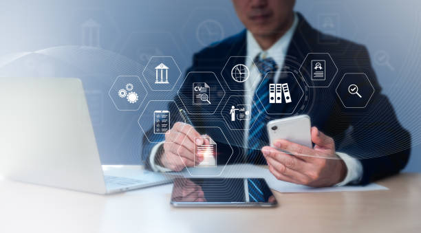 istock Virtual Compliance Diagram for regulations, laws, standards, requirements, and audit. Concept of coworking team meeting, businessman using smart phone, digital tablet, laptop computer in modern office 1437695991