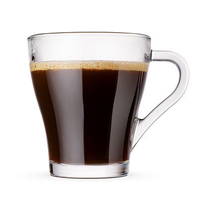 Coffee americano in a transparent glass cup isolated on a white background.