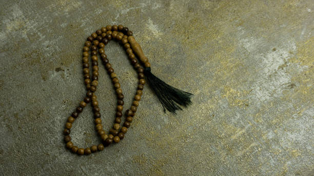 istock wooden tasbih beads isolated. islamic prayer beads 1437697753