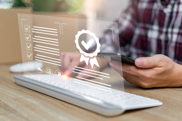 istock Customer rating to service experience and Warranty for parcel delivery online application,Man reviewing the online delivery process and the terms of the warranty.parcel delivery service in smartphone 1437699033