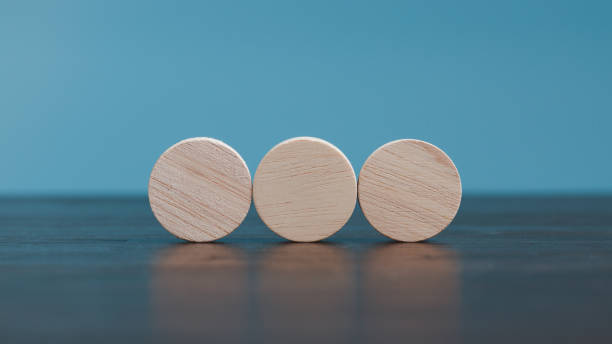 istock Stacking blank wooden cubes on blue background with copy space for input wording and infographic icon. Empty brown wooden object block for symbol icon put technology, zero gravity, business concept. 1437701166