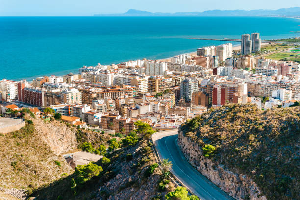 istock View from a mountain on a small town on a seashore 1437702112
