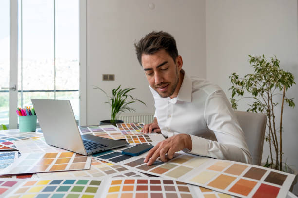 istock Designer man working with laptop in office 1437702534