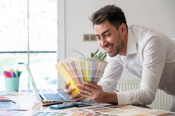 istock Designer man holding color cards 1437703054