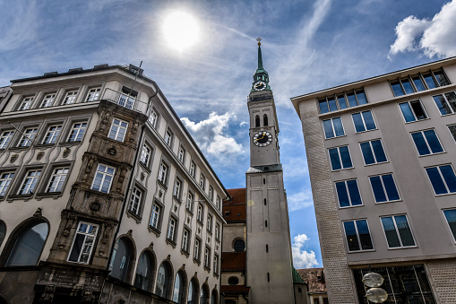 Clocktower Of St. Peter's Church And Buildings Around It In Munich, Germany