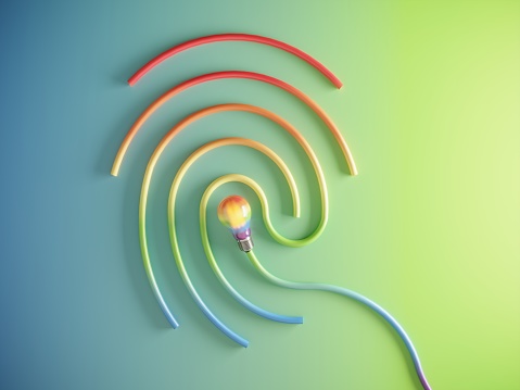 Multi colored 3d fingerprint pattern with rainbow colored lightbulb, flat lay. (3drender)