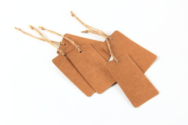 istock Blank paper price tag or label on white background 1437706349