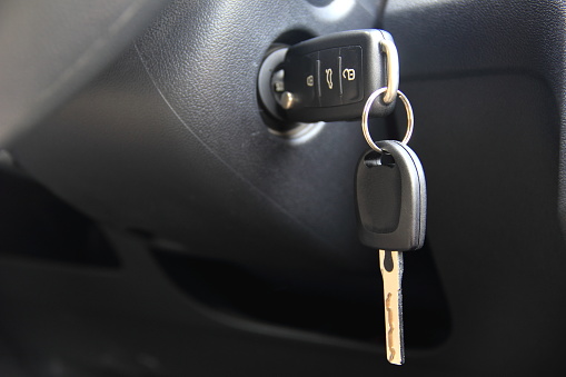 Bunch of keys on a keyring isolated on a white background