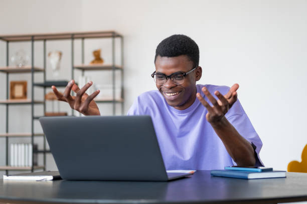 istock Black businessman on a video conference, talking in office room 1437707079