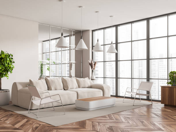istock Light relax interior with couch and chairs, art decoration and panoramic window 1437708486