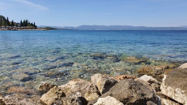 istock Rocky beach on a sunny day 1437716641