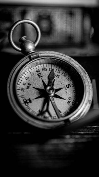 istock Grayscale vertical closeup of a compass 1437717051