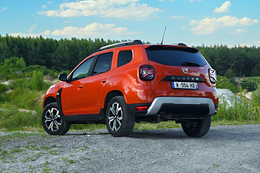 Zdiar, Slovakia - 25th June, 2022: Second generation of Dacia Duster (after facelift) stopped on a road. This low-cost car is one of the most popular SUV vehicles in Europe.